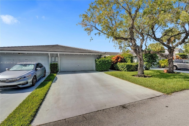 8406 NW 78th Ct, Tamarac, FL 33321 - ranch-style house with concrete driveway, a garage, and a front yard