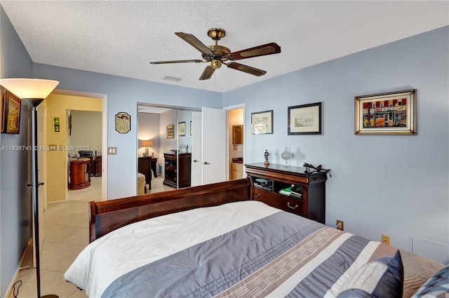 8406 NW 78th Ct, Tamarac, FL 33321 - bedroom featuring a closet, light tile patterned flooring, and a ceiling fan