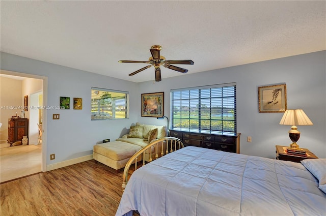 8406 NW 78th Ct, Tamarac, FL 33321 - bedroom with wood finished floors and ceiling fan