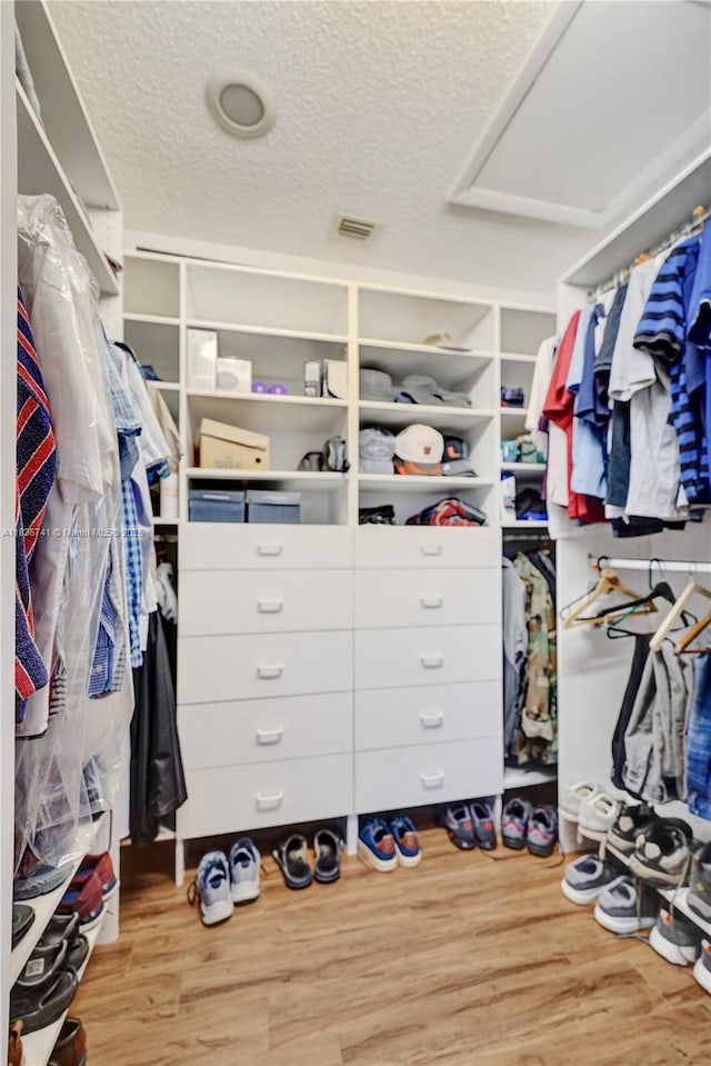 8406 NW 78th Ct, Tamarac, FL 33321 - spacious closet featuring wood finished floors