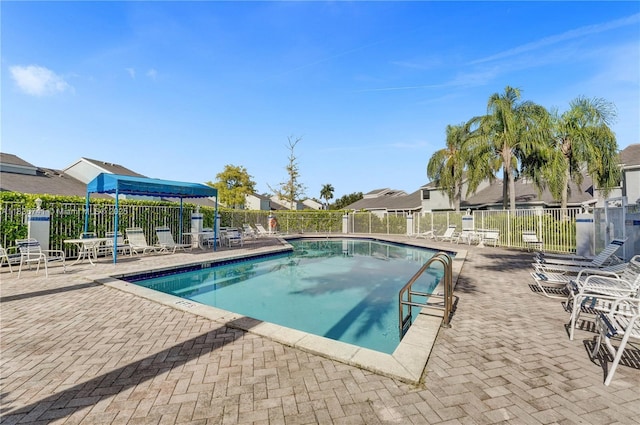 8406 NW 78th Ct, Tamarac, FL 33321 - community pool with a patio area