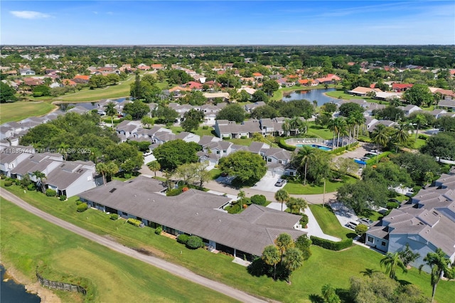 8406 NW 78th Ct, Tamarac, FL 33321 - aerial overview of property's location featuring nearby suburban area, a golf course, and a nearby body of water