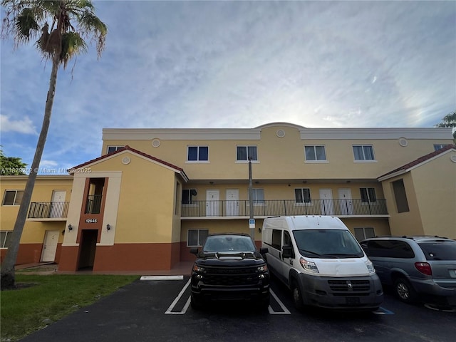 12645 SW 91st St Unit 202, Miami, FL 33186 - view of property featuring uncovered parking