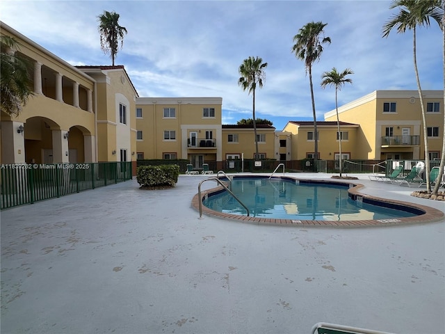 12645 SW 91st St Unit 202, Miami, FL 33186 - community pool featuring a patio and a residential view
