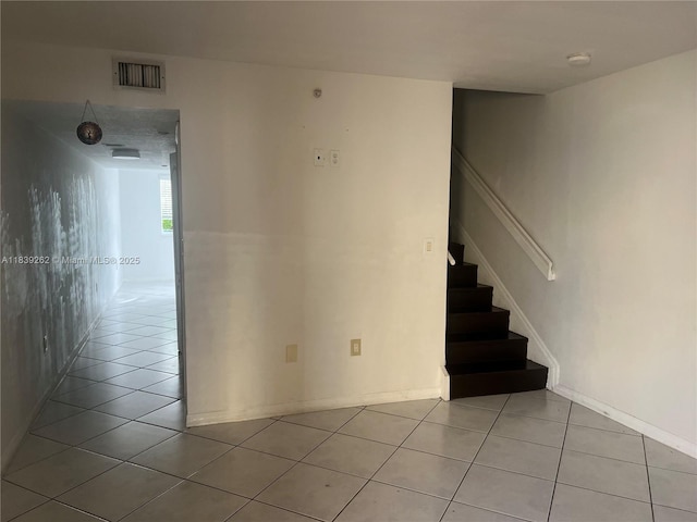 12645 SW 91st St Unit 202, Miami, FL 33186 - staircase featuring tile patterned flooring