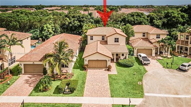 10608 NW 36th St, Coral Springs, FL 33065 - view of front of house with stucco siding, a tile roof, a residential view, and driveway