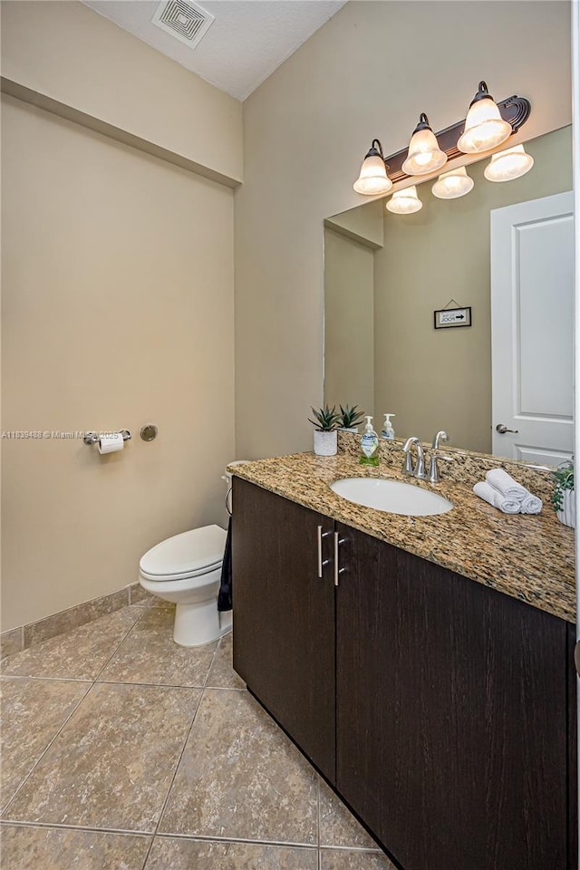 10608 NW 36th St, Coral Springs, FL 33065 - half bathroom with vanity and tile patterned flooring