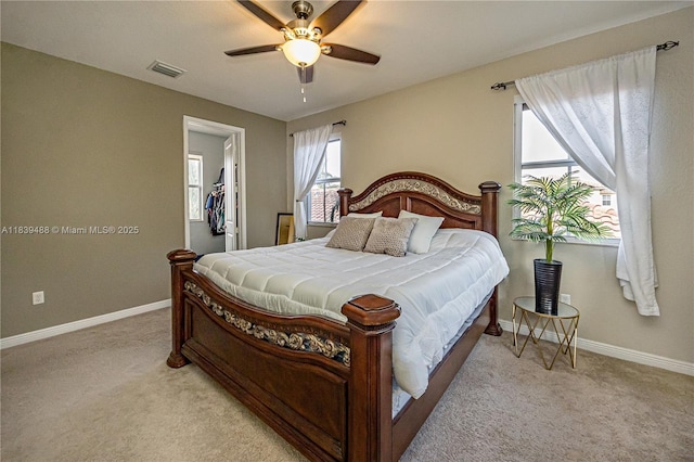 10608 NW 36th St, Coral Springs, FL 33065 - bedroom with light carpet, ceiling fan, and a spacious closet