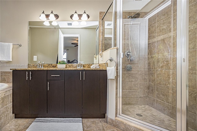 10608 NW 36th St, Coral Springs, FL 33065 - full bath with a stall shower, double vanity, a relaxing tiled tub, and tile patterned flooring
