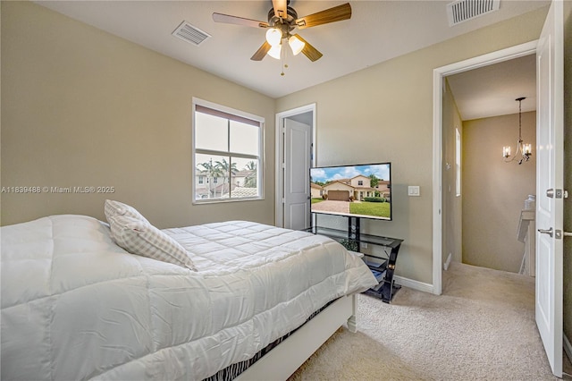 10608 NW 36th St, Coral Springs, FL 33065 - carpeted bedroom featuring a chandelier and a ceiling fan