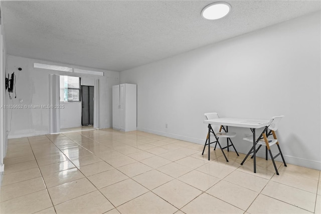 6600 Royal Palm Blvd Unit 103B, Margate, FL 33063 - unfurnished room featuring a textured ceiling and light tile patterned floors