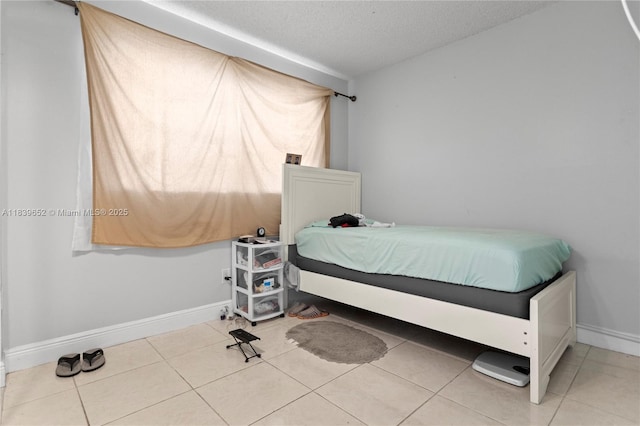6600 Royal Palm Blvd Unit 103B, Margate, FL 33063 - bedroom featuring a textured ceiling and tile patterned flooring