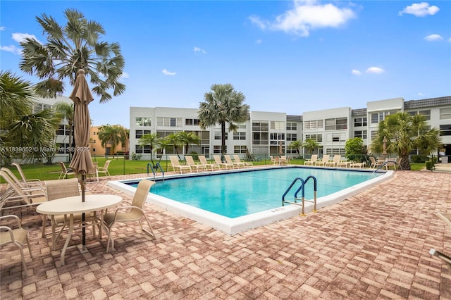 6600 Royal Palm Blvd Unit 103B, Margate, FL 33063 - community pool with a patio