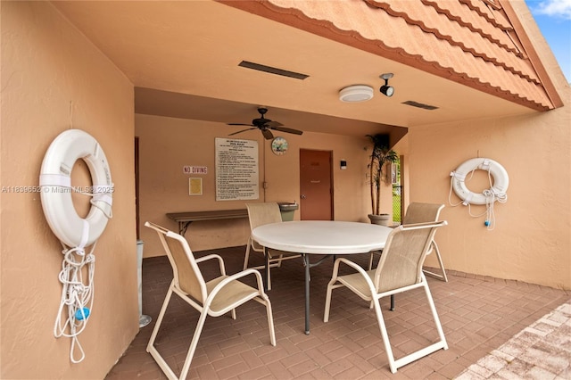 6600 Royal Palm Blvd Unit 103B, Margate, FL 33063 - view of patio / terrace featuring a ceiling fan and outdoor dining space