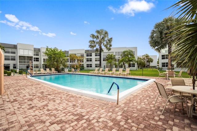 6600 Royal Palm Blvd Unit 103B, Margate, FL 33063 - community pool featuring a patio area