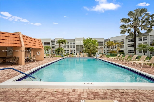 6600 Royal Palm Blvd Unit 103B, Margate, FL 33063 - community pool with a patio area