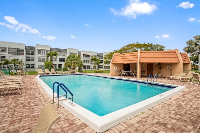 6600 Royal Palm Blvd Unit 103B, Margate, FL 33063 - community pool featuring a patio area