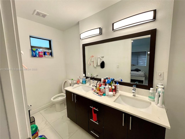 2957 NW 45th St, Miami, FL 33142 - bathroom with double vanity, marble look tiles, and ensuite bathroom
