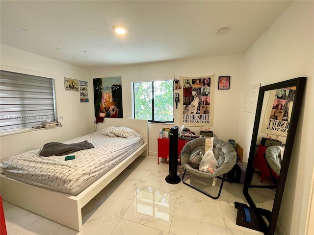 2957 NW 45th St, Miami, FL 33142 - bedroom with light marble finish floors and recessed lighting