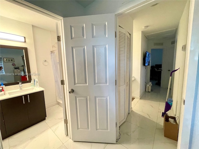 2957 NW 45th St, Miami, FL 33142 - bathroom with marble look tiles, a closet, vanity, and a shower with shower curtain