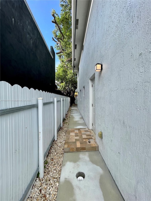 2957 NW 45th St, Miami, FL 33142 - view of side of property with stucco siding
