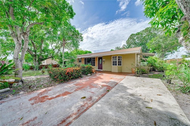 7140 Fillmore St, Hollywood, FL 33024 - ranch-style home with stucco siding and driveway