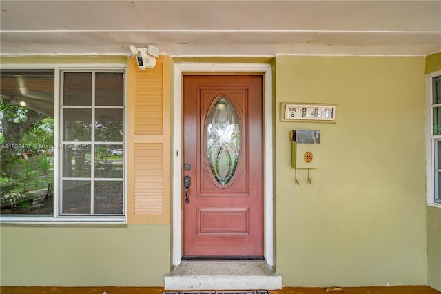 7140 Fillmore St, Hollywood, FL 33024 - view of exterior entry featuring stucco siding