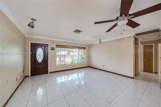 7140 Fillmore St, Hollywood, FL 33024 - foyer entrance featuring ornamental molding, light tile patterned flooring, and ceiling fan