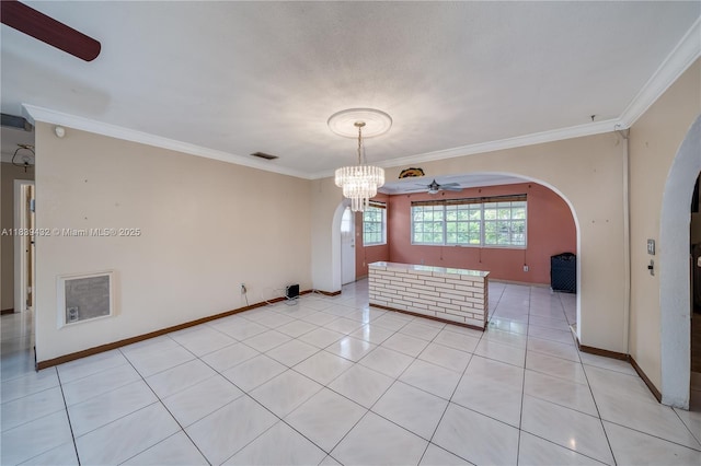 7140 Fillmore St, Hollywood, FL 33024 - empty room featuring arched walkways, a ceiling fan, crown molding, and light tile patterned floors
