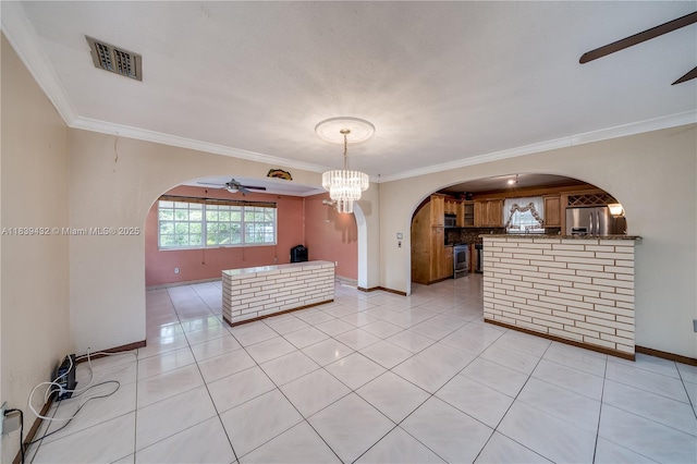 7140 Fillmore St, Hollywood, FL 33024 - unfurnished living room featuring arched walkways, a ceiling fan, light tile patterned flooring, crown molding, and a chandelier