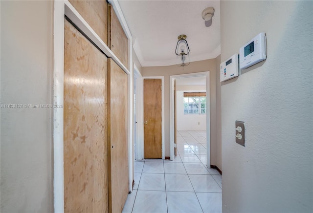 7140 Fillmore St, Hollywood, FL 33024 - corridor featuring light tile patterned flooring and ornamental molding