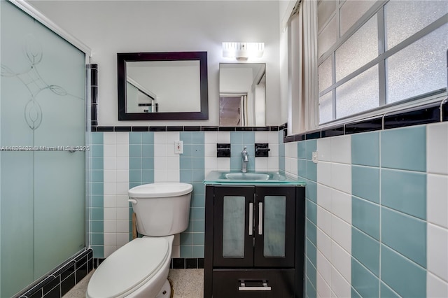 7140 Fillmore St, Hollywood, FL 33024 - full bath with tile walls, vanity, a shower stall, and a wainscoted wall