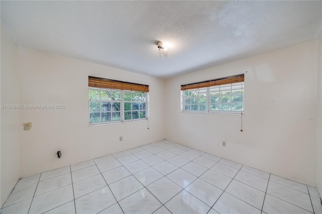 7140 Fillmore St, Hollywood, FL 33024 - empty room featuring a textured ceiling