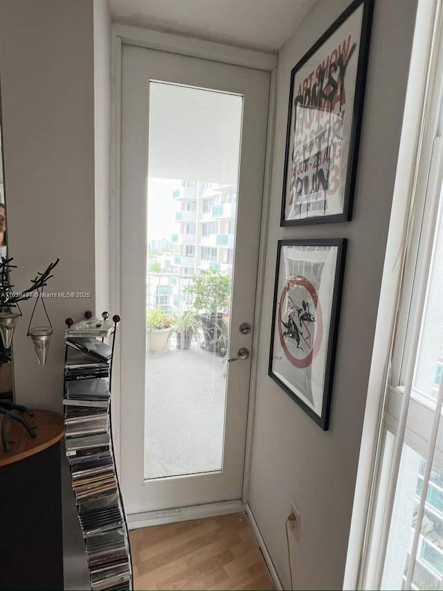 1228 W Ave Unit 911, Miami Beach, FL 33139 - entryway with light wood finished floors