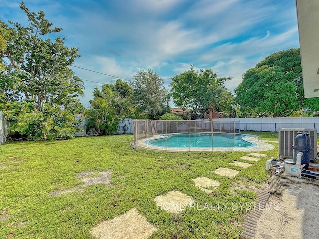 2359 Gabriel Ln, West Palm Beach, FL 33406 - view of swimming pool with a fenced backyard