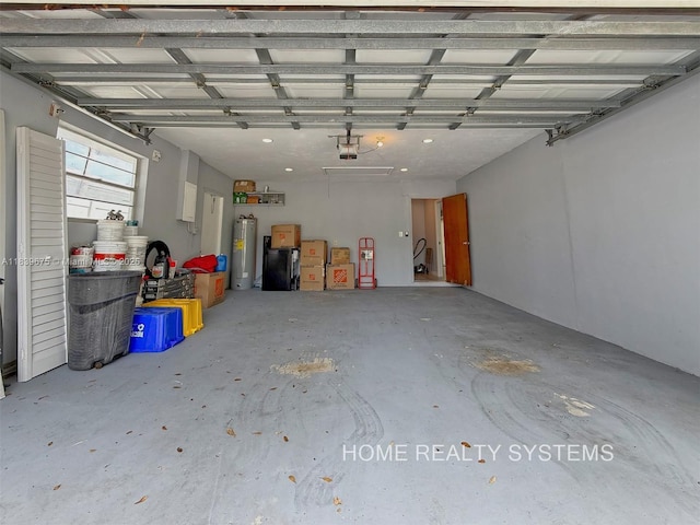 2359 Gabriel Ln, West Palm Beach, FL 33406 - garage with electric water heater and a garage door opener