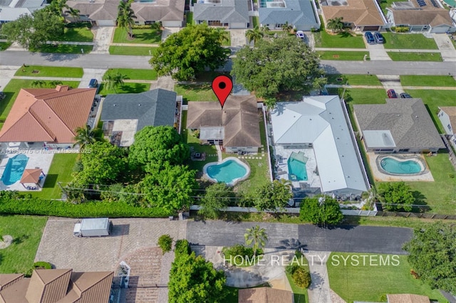 2359 Gabriel Ln, West Palm Beach, FL 33406 - aerial view of residential area featuring a pool area