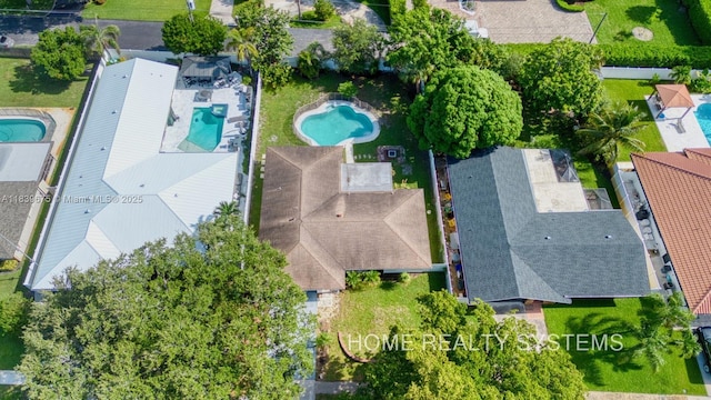 2359 Gabriel Ln, West Palm Beach, FL 33406 - drone / aerial view of a pool area