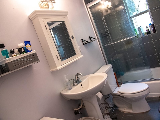 3521 SW 59th Ave, Miami, FL 33155 - bathroom featuring toilet and combined bath / shower with glass door