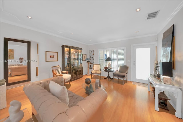 2665 SW 17th Ave, Miami, FL 33133 - living room featuring ornamental molding, light wood-style flooring, and recessed lighting