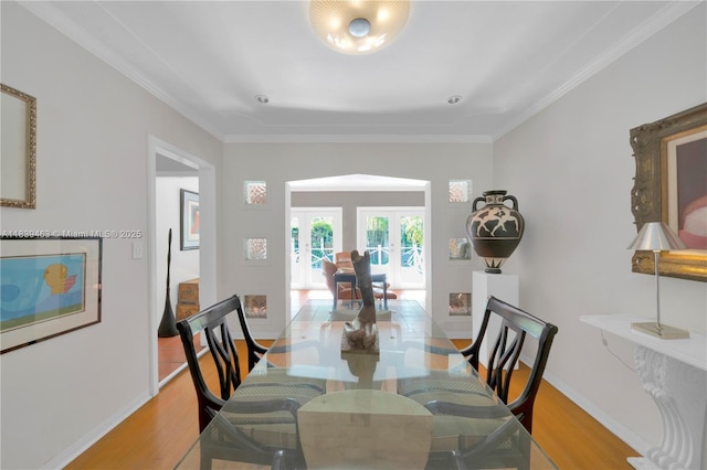 2665 SW 17th Ave, Miami, FL 33133 - dining area with french doors, light wood-style floors, and ornamental molding
