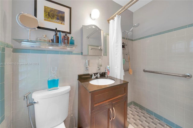 2665 SW 17th Ave, Miami, FL 33133 - full bathroom featuring tile walls, tiled shower, and vanity
