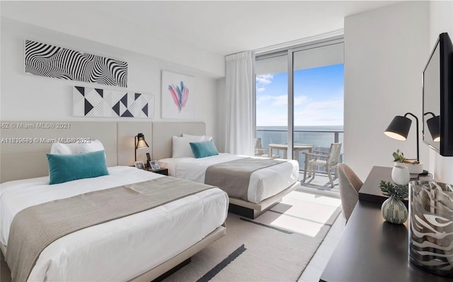 4010 S Ocean Dr Unit T4105, Hollywood, FL 33019 - bedroom featuring a wall of windows and access to outside