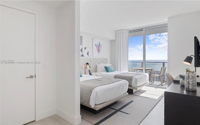 4010 S Ocean Dr Unit T4105, Hollywood, FL 33019 - bedroom with expansive windows and access to exterior