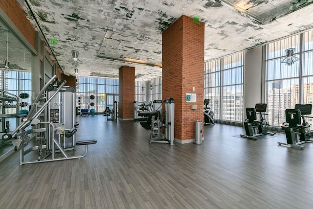 4010 S Ocean Dr Unit T4105, Hollywood, FL 33019 - exercise room featuring a wall of windows, wood finished floors, plenty of natural light, a towering ceiling, and a city view