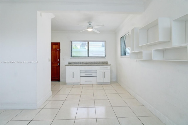 350 75th St Unit 201, Miami Beach, FL 33141 - kitchen featuring open shelves, ornamental molding, a ceiling fan, white cabinets, and light tile patterned floors