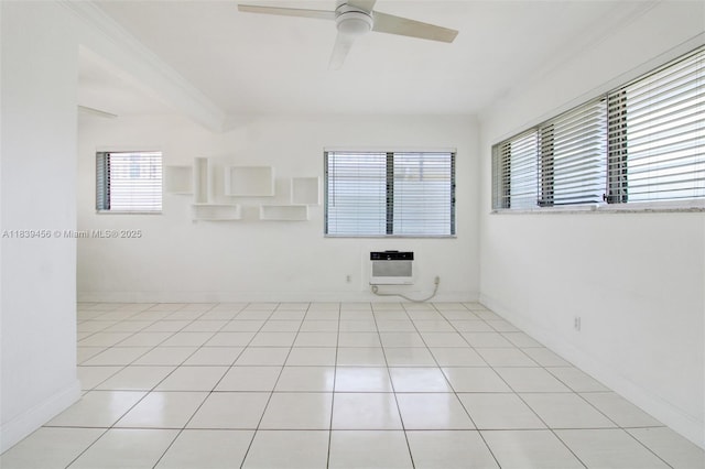 350 75th St Unit 201, Miami Beach, FL 33141 - spare room with ceiling fan, heating unit, light tile patterned floors, and ornamental molding