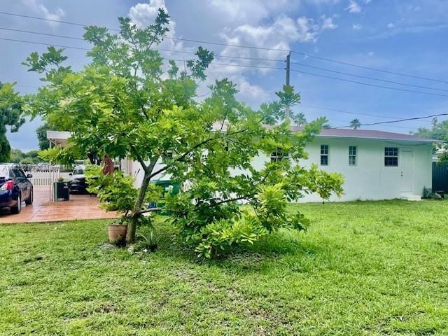 140 NW 199th St, Miami Gardens, FL 33169 - view of yard featuring a wooden deck