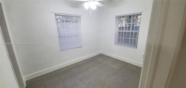 1887 NW 66th St, Miami, FL 33147 - spare room with baseboards and ceiling fan