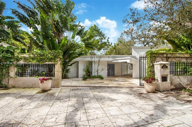 3200 Morris Ln, Miami, FL 33133 - gate with a patio